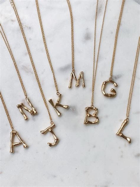 celine letter necklace price|bamboo initial necklace celine.